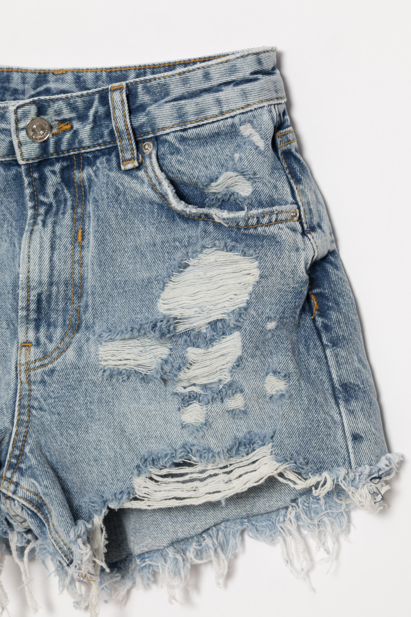 Jeansowe szorty dziewczęce z przetarciami | Reporter 
