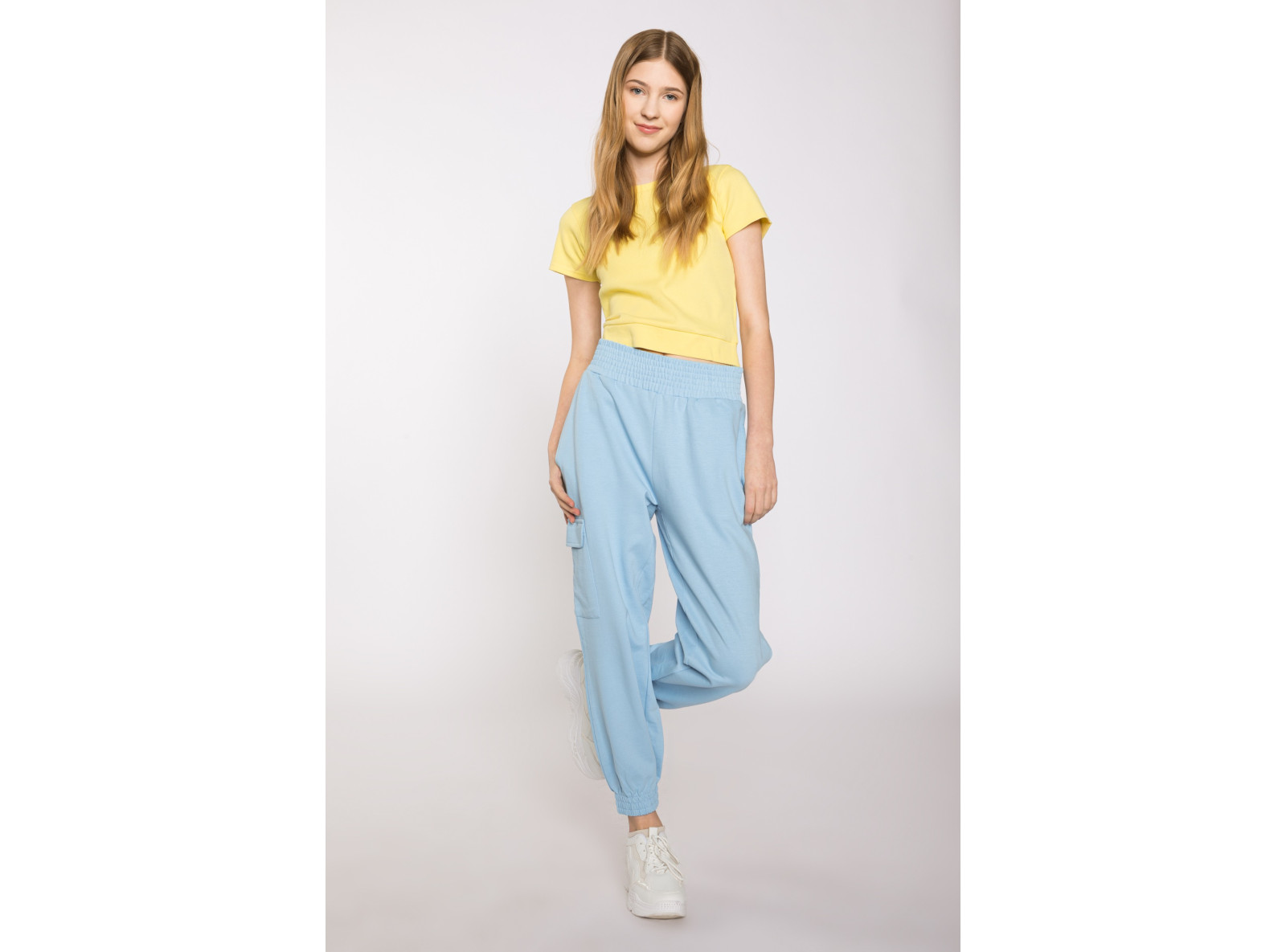 Żółty t-shirt dla dziewczyny ze ściągaczem u dołu