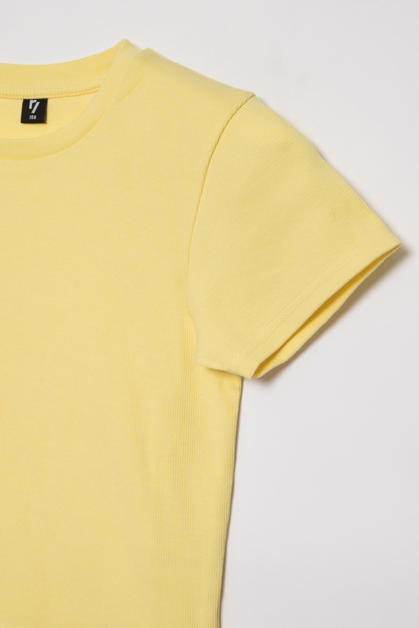 Żółty t-shirt dla dziewczyny ze ściągaczem u dołu