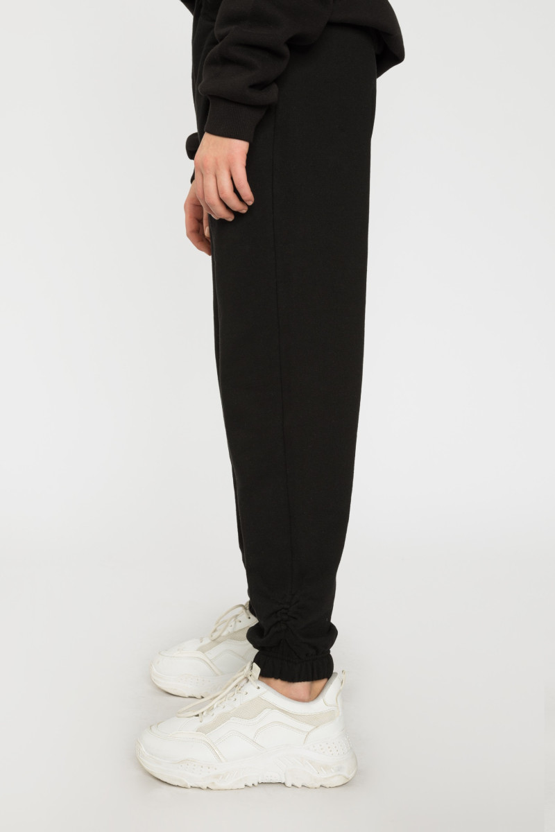 Czarne spodnie dresowe dla dziewczyny ze ściągaczem ANTISOCIAL BUTTERFLY