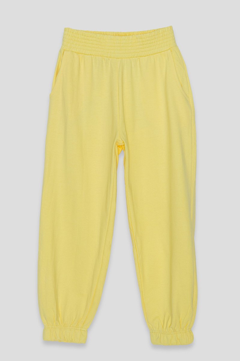 Żółte pastelowe spodnie dresowe ze ściągaczem