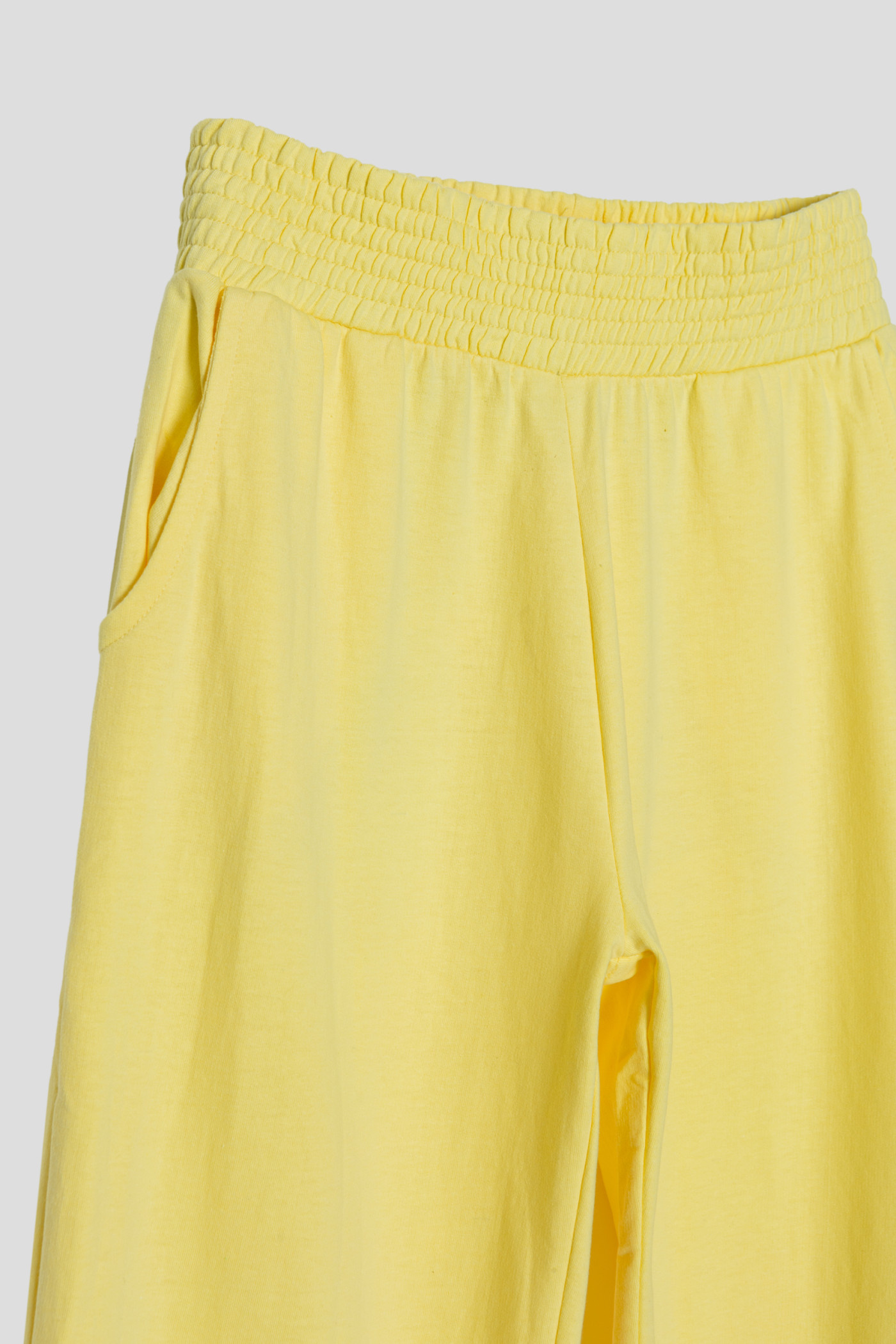 Żółte pastelowe spodnie dresowe ze ściągaczem