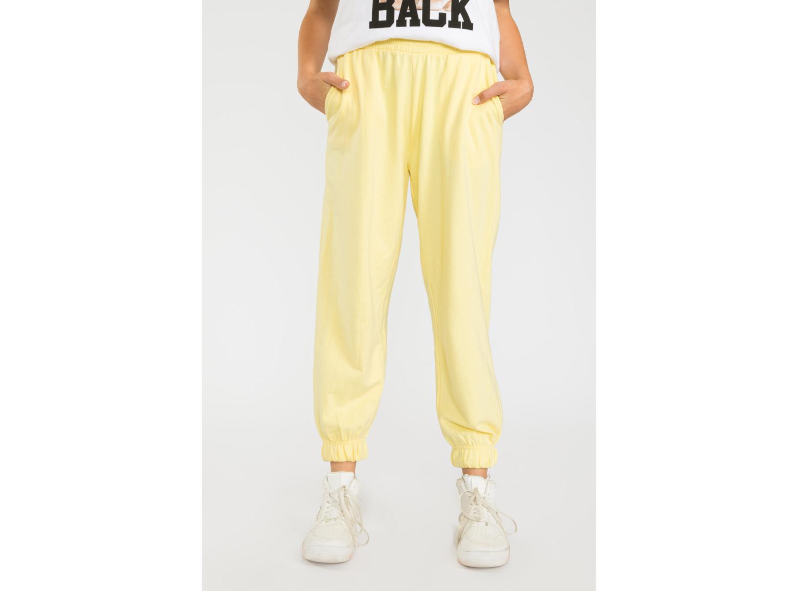 Żółte pastelowe spodnie dresowe ze ściągaczem