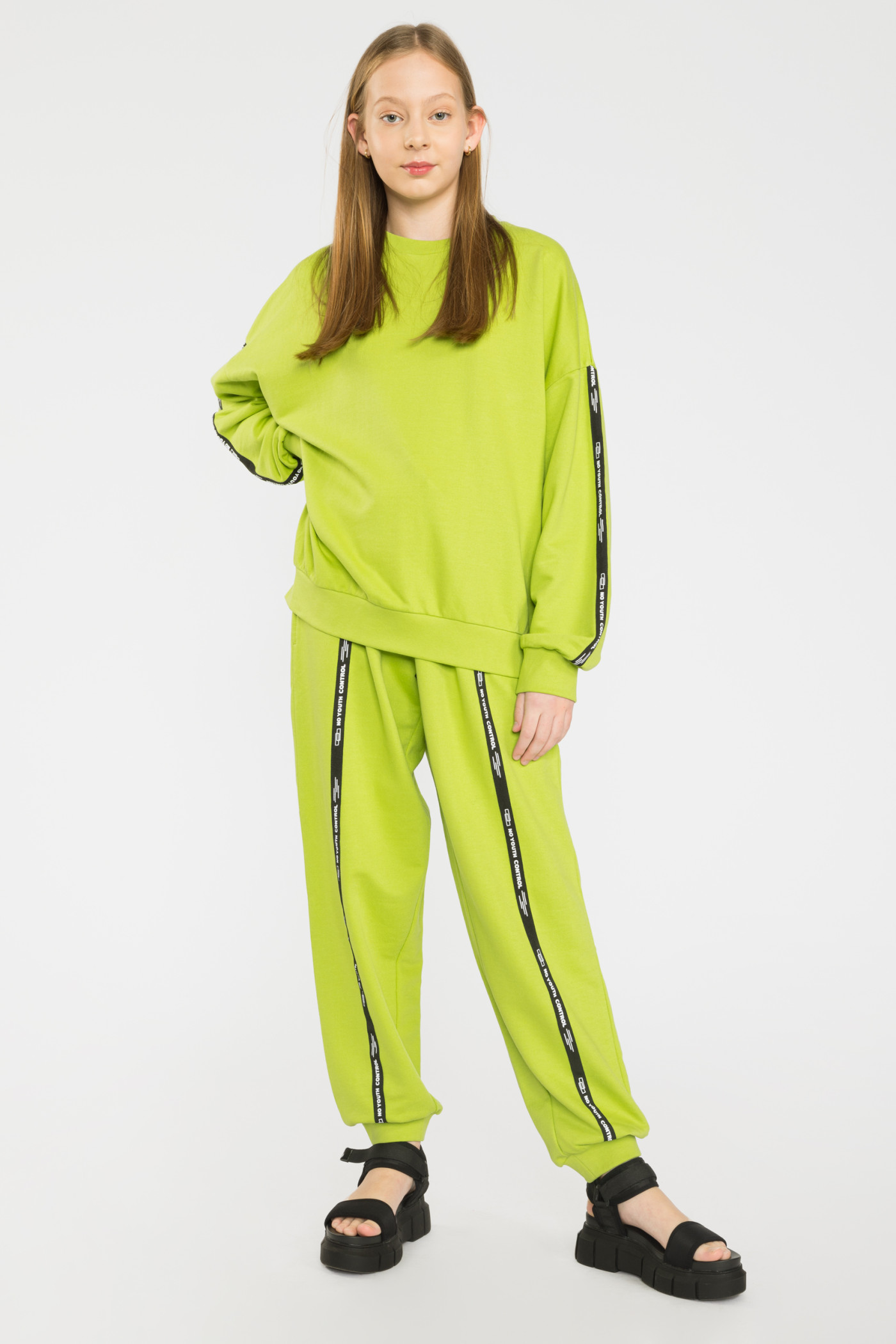 Limonkowe spodnie dresowe z ozdobnymi taśmami NO YOUTH CONTROL