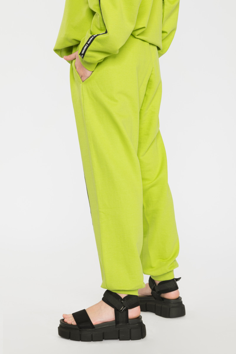 Limonkowe spodnie dresowe z ozdobnymi taśmami NO YOUTH CONTROL