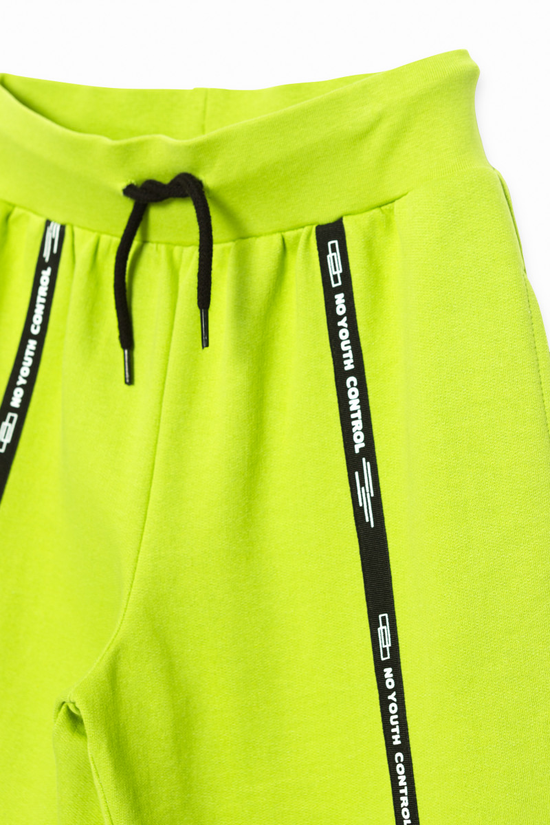 Limonkowe spodnie dresowe z ozdobnymi taśmami NO YOUTH CONTROL