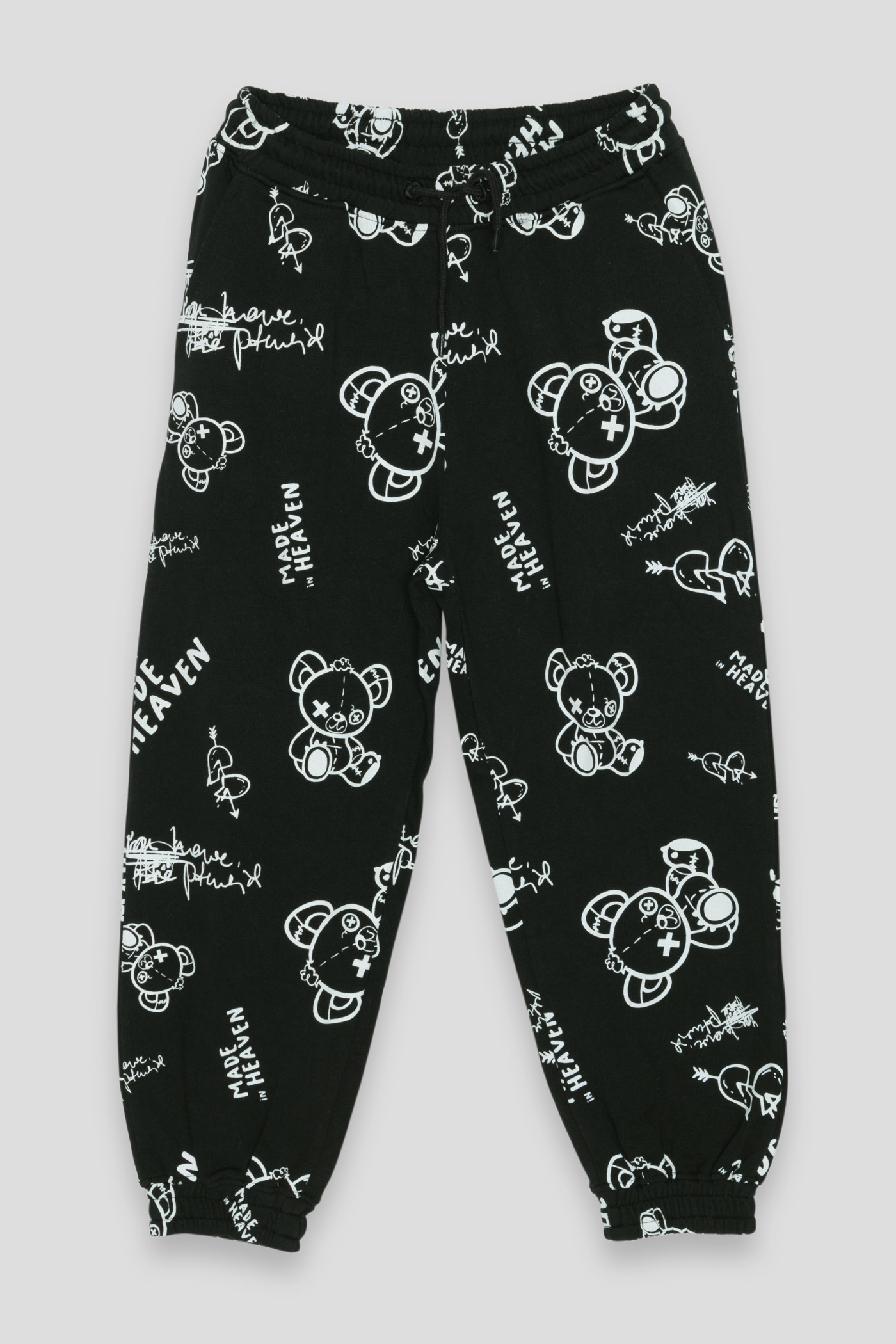 Czarne spodnie dresowe z nadrukami MADE IN HEAVEN