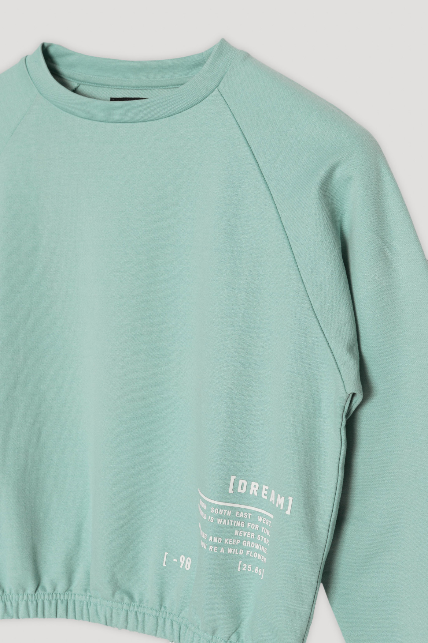 Miętowa bluza dresowa z ozdobnym napisem