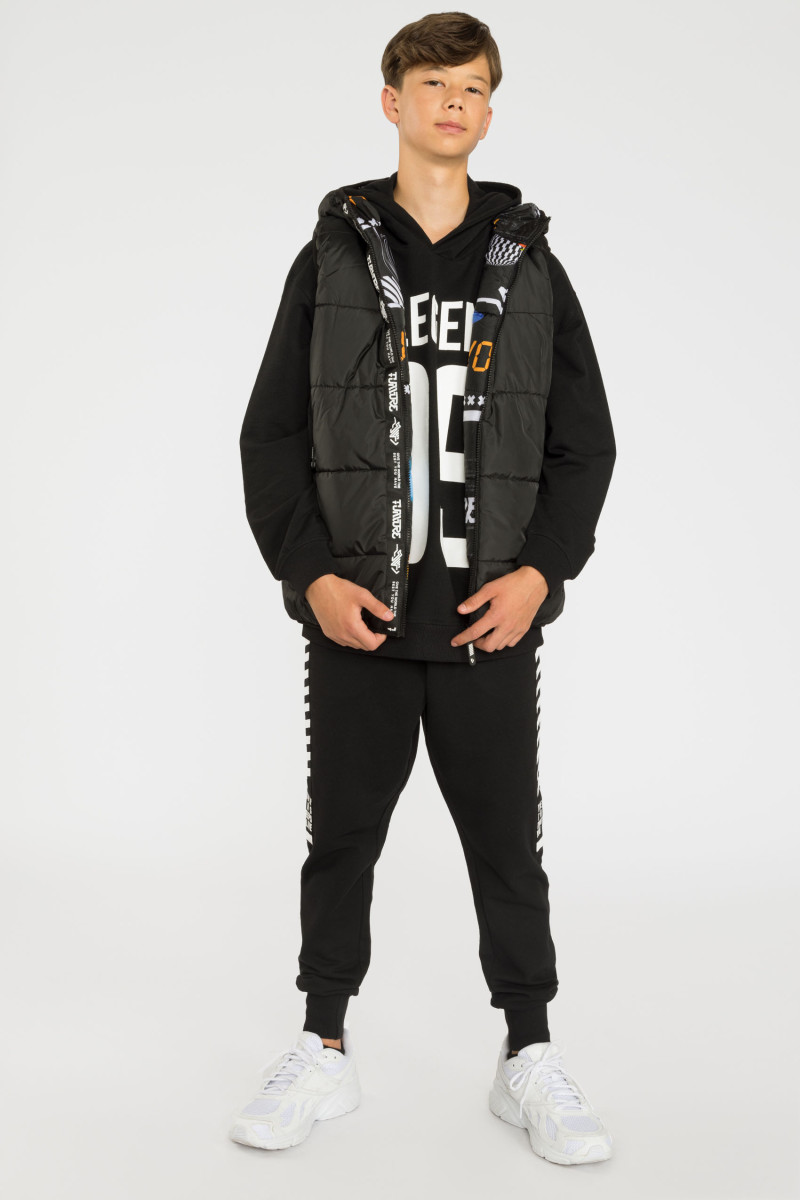 Wzorzysty pikowany dwustronny bezrękawnik DIGITAL