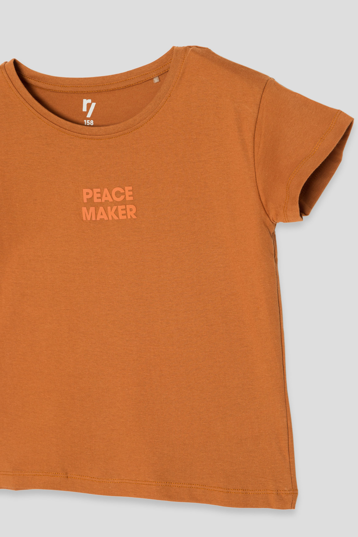 Brązowy T-shirt z ozdobnym napisem