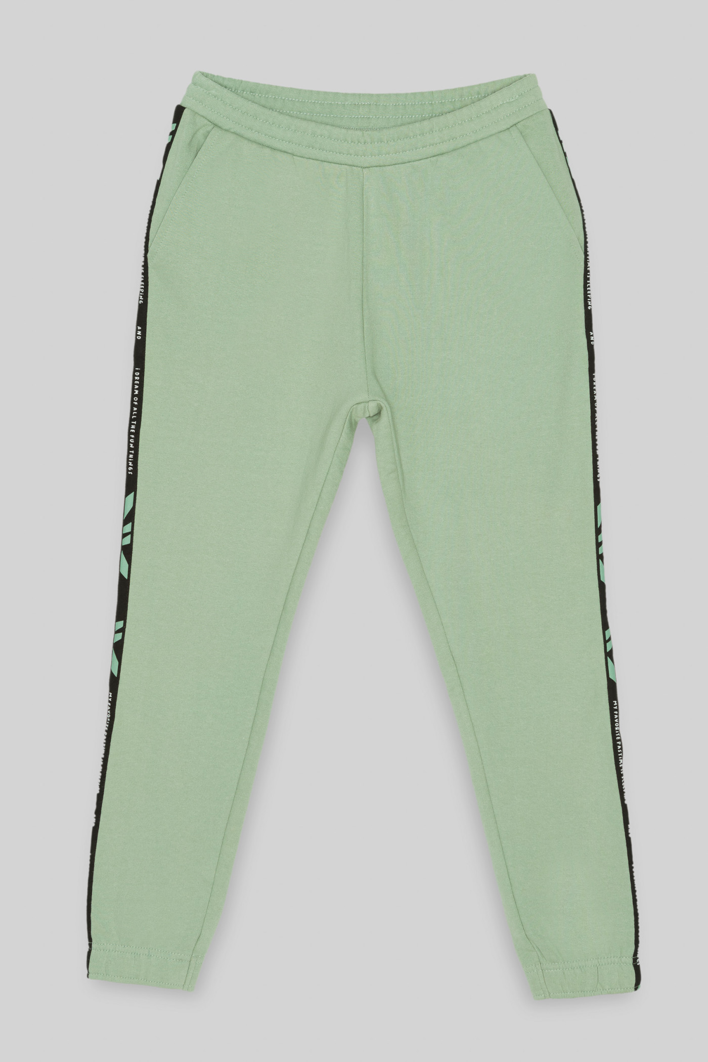 Pistacjowe spodnie dresowe z lampasami