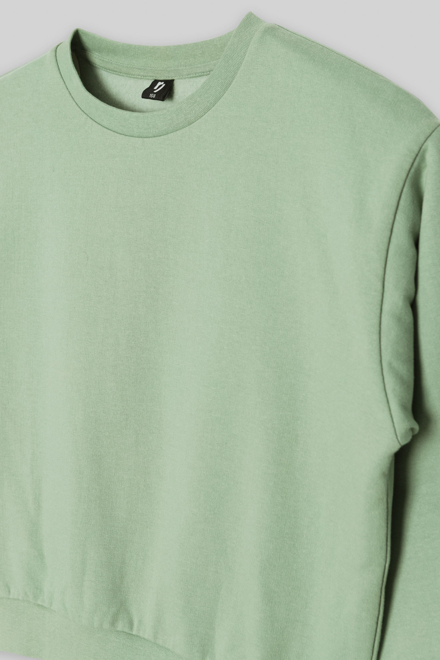 Pistacjowa bluza dresowa z lampasami