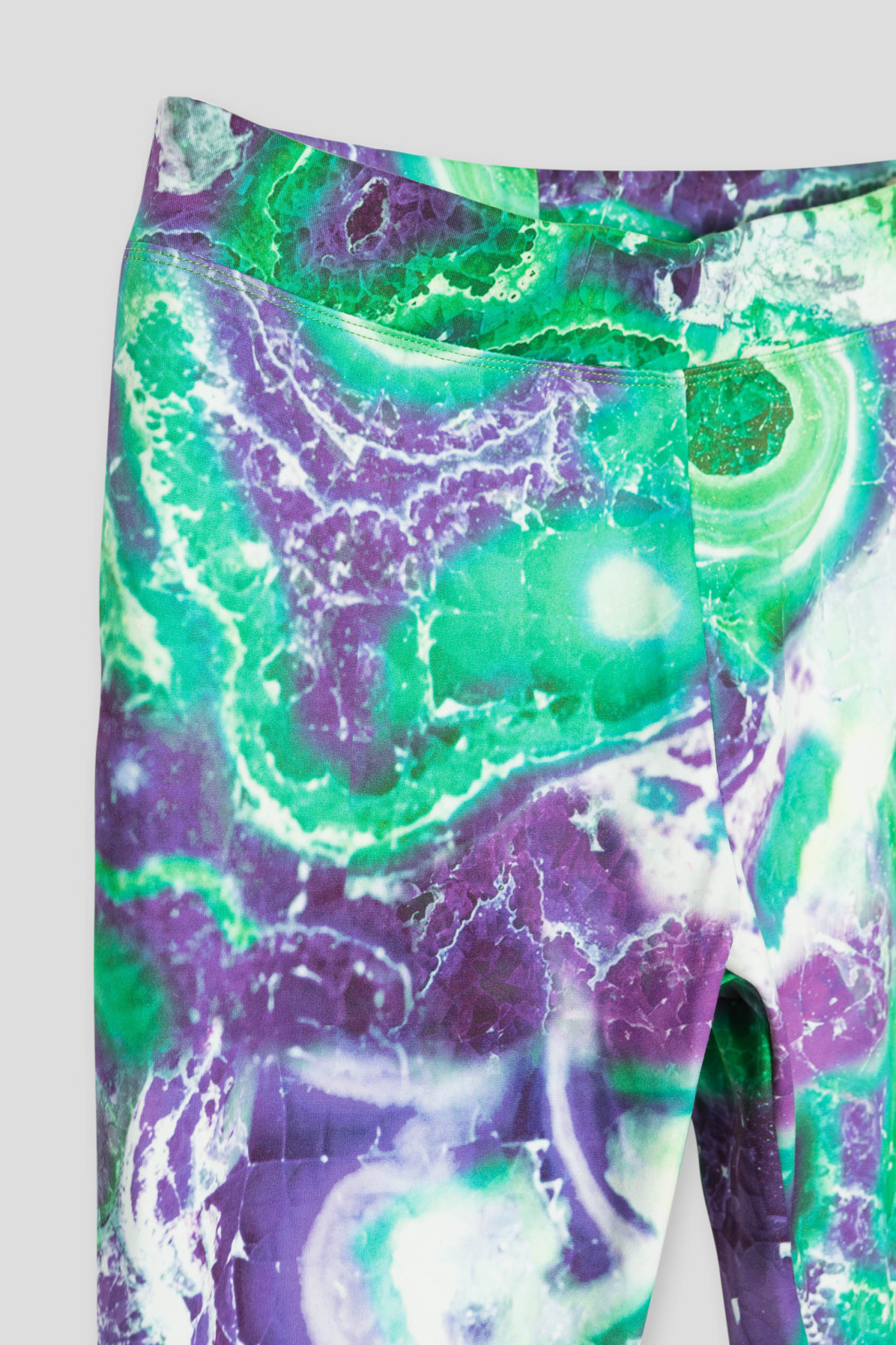 Zielone wzorzyste legginsy