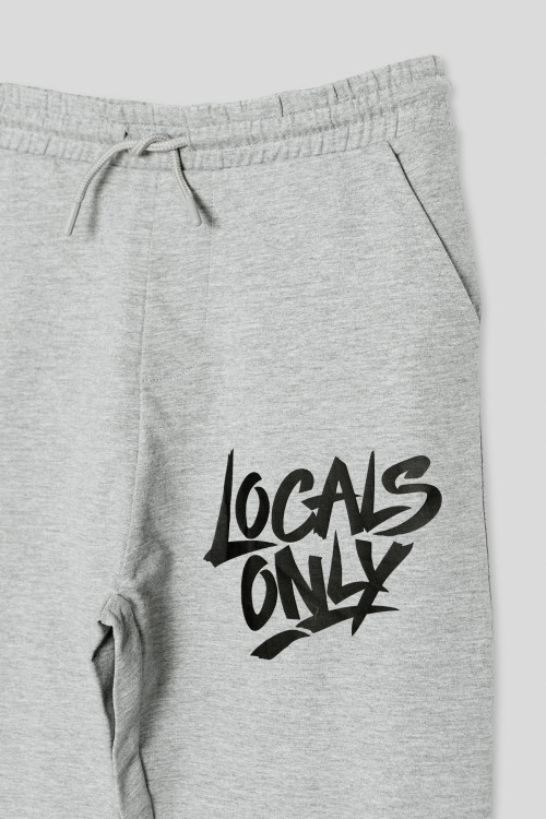 Szare spodnie dresowe z nadrukiem na nogawce