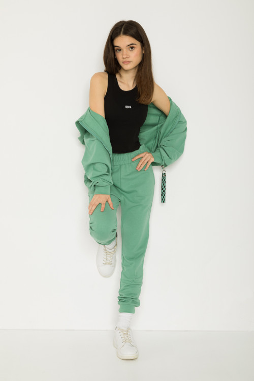 Zielone spodnie dresowe z nadrukiem graffiti