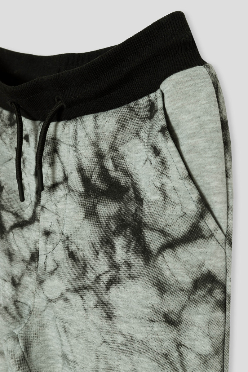 Szare spodnie dresowe z nadrukami