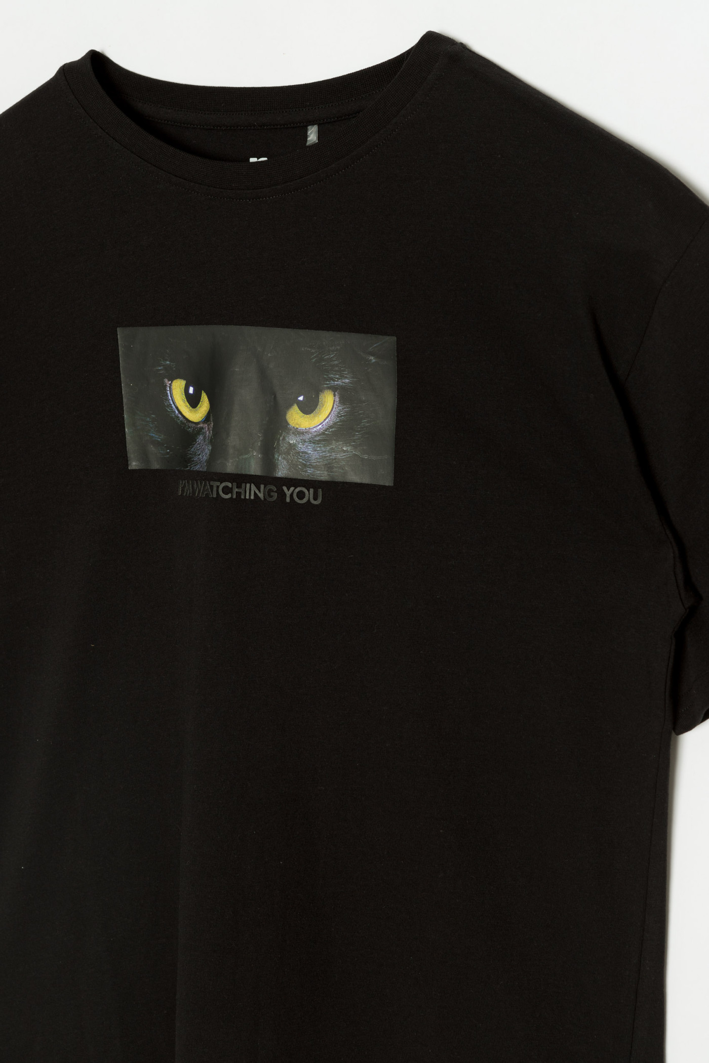 Czarny T-shirt oversize z nadrukiem z motywem kota