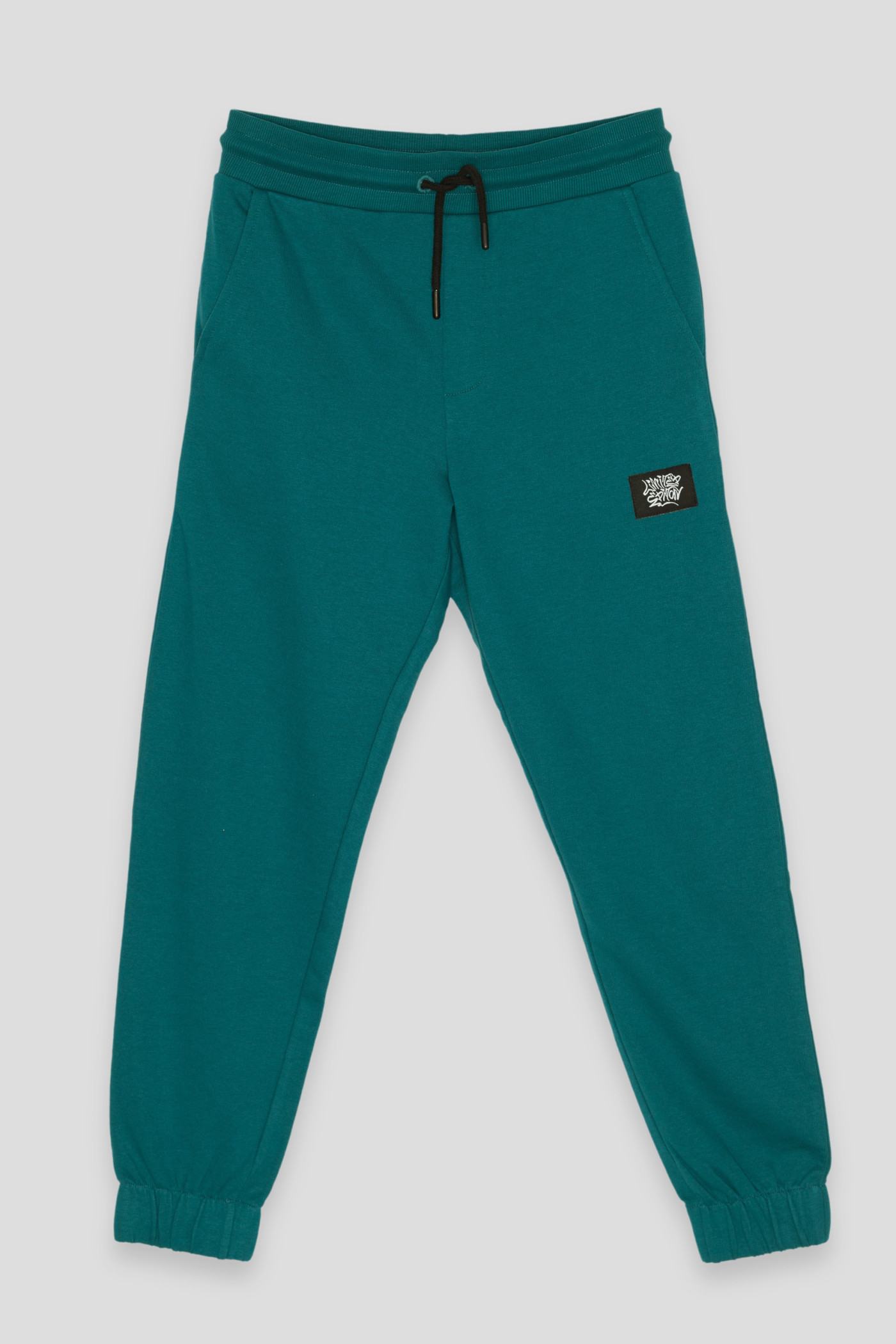 Spodnie dresowe w kolorze morskim