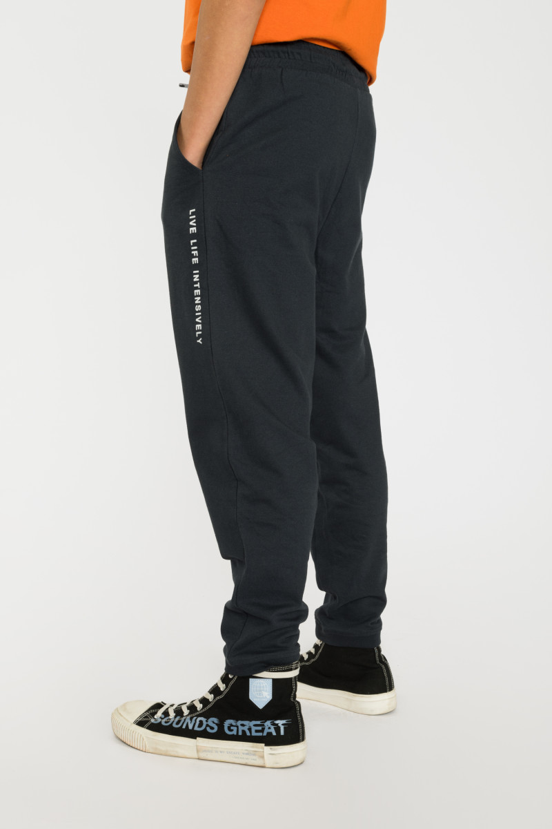 Granatowe spodnie dresowe z nadrukiem