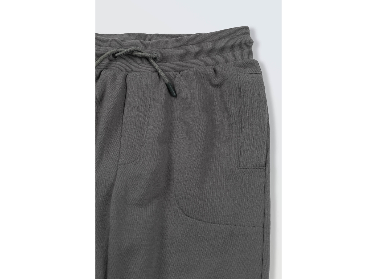 Szare spodnie dresowe z nadrukiem z tyłu