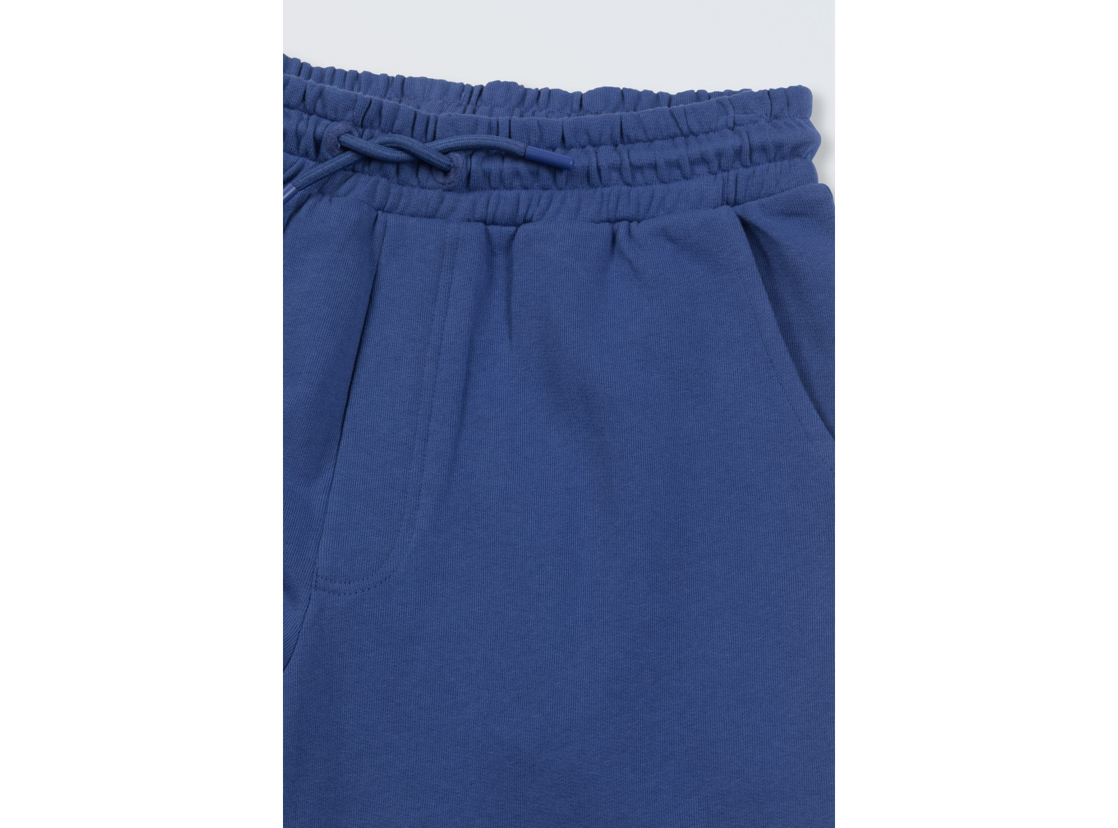 Niebieskie spodnie dresowe z nadrukiem z tyłu