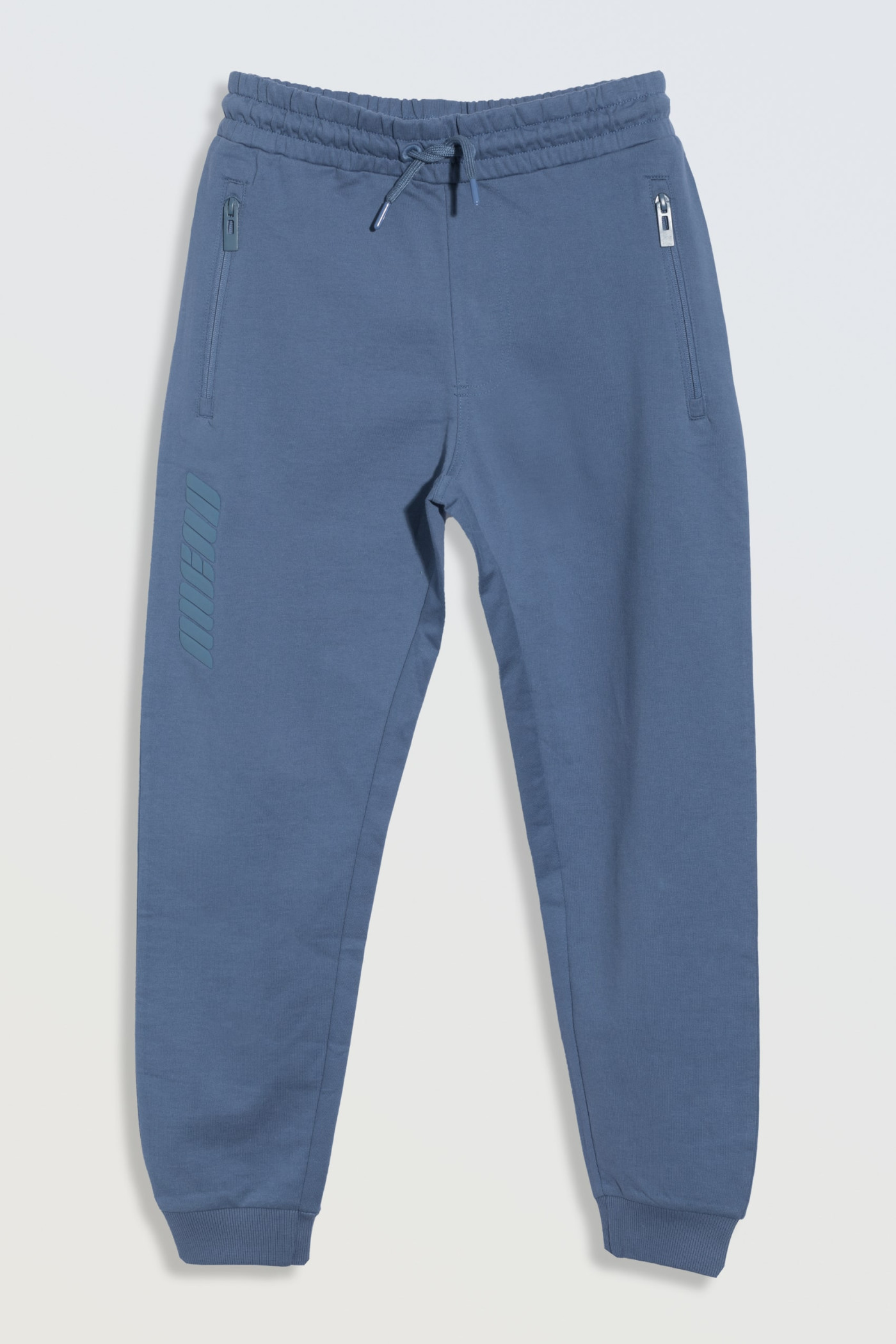 Niebieskie spodnie dresowe z kieszeniami zapinanymi na zamek