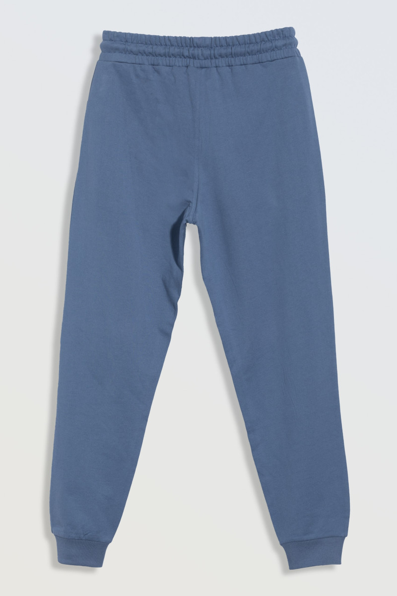Niebieskie spodnie dresowe z kieszeniami zapinanymi na zamek
