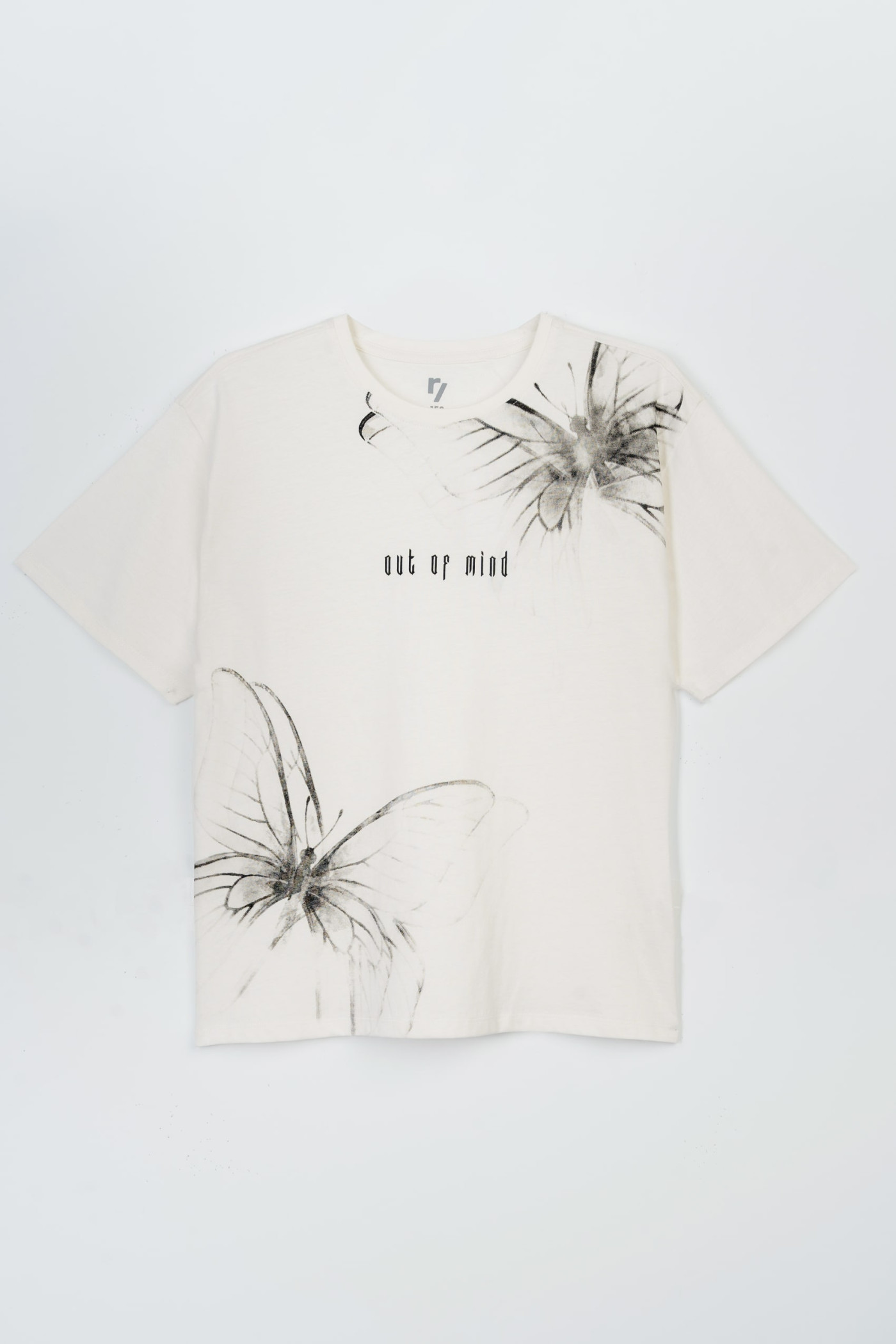 Beżowy t-shirt z kolorowymi nadrukami z przodu