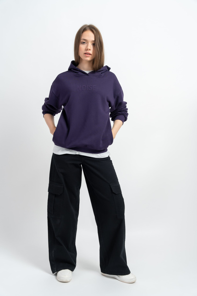 Czarne spodnie bawełniane typu cargo z przestrzennymi kieszeniami, czarny