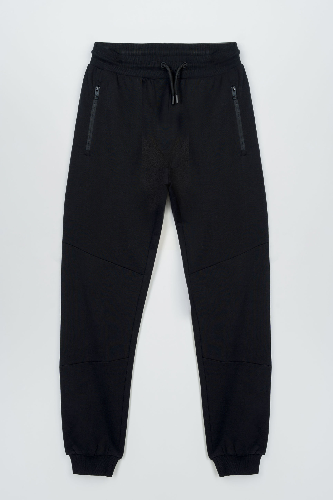 Czarne spodnie dresowe z modnymi cięciami na nogawkach