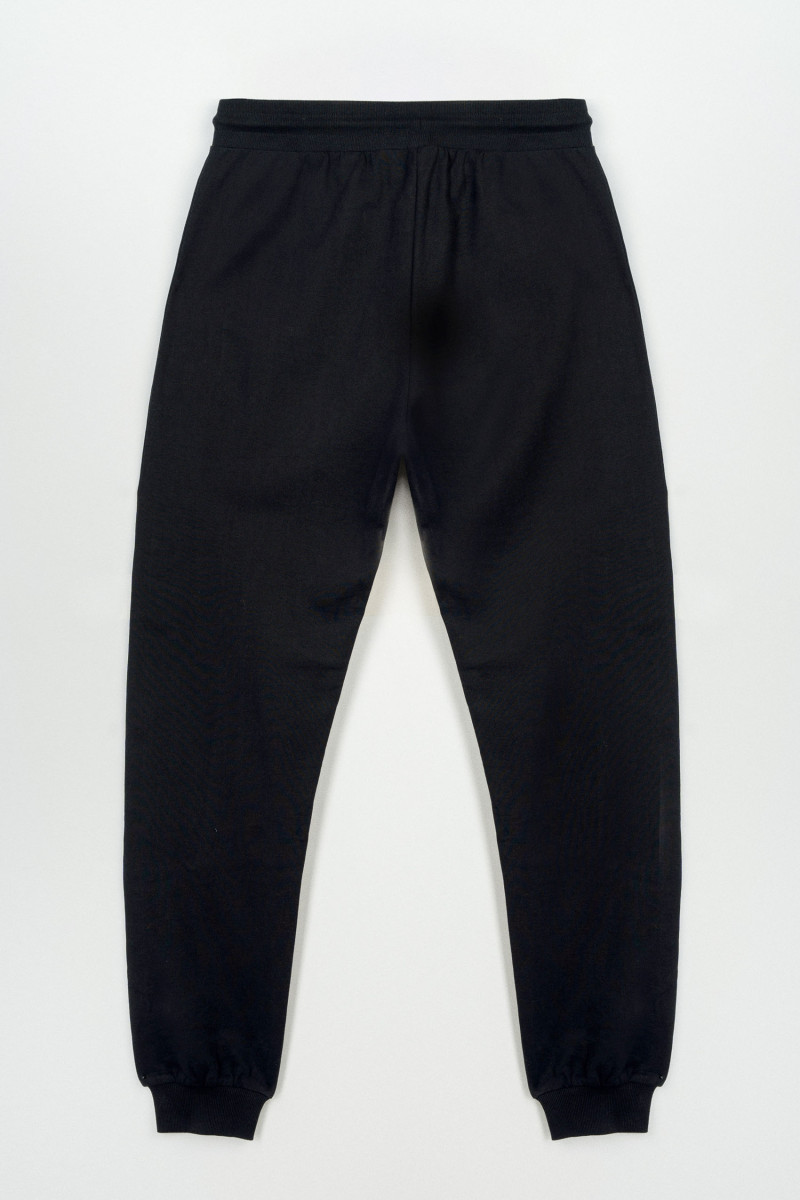 Czarne spodnie dresowe z modnymi cięciami na nogawkach