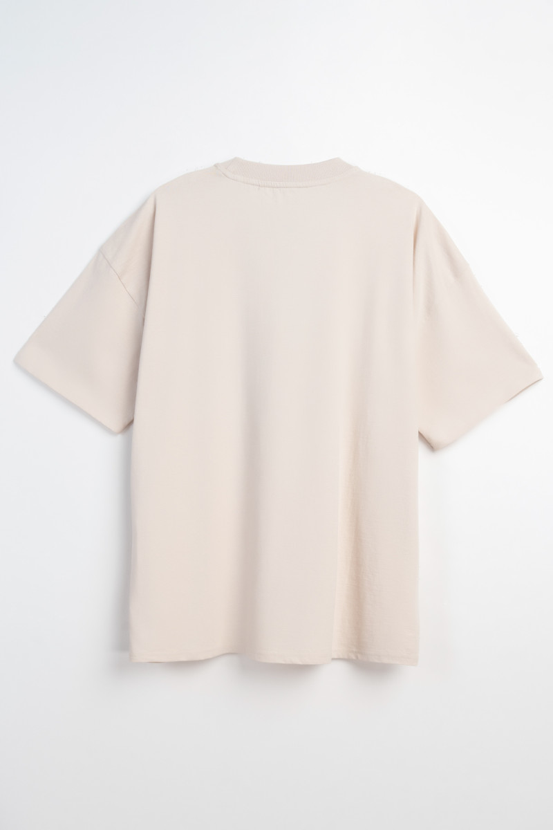 Beżowy t-shirt OVERSIZE z autorską grafiką z przodu