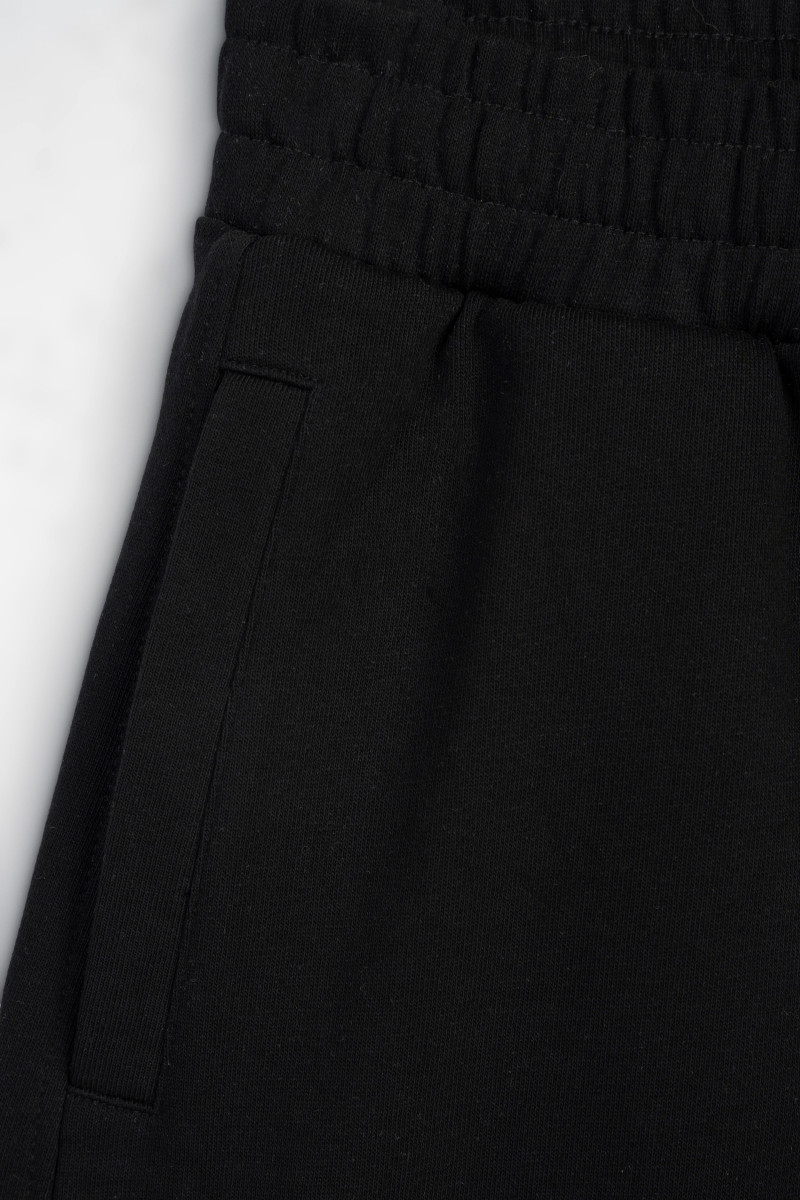 Czarne spodnie dresowe gładkie o kroju BALLOON
