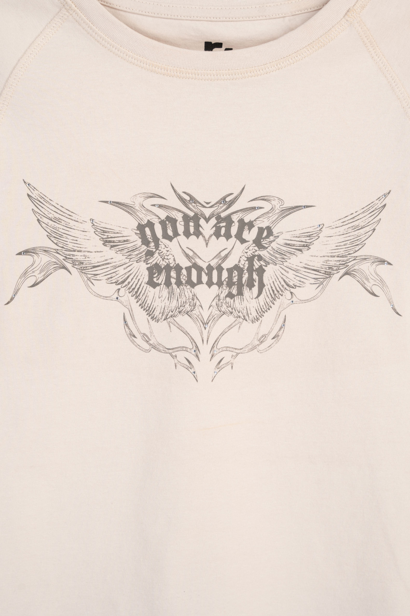 Beżowa bluzka SLIM z autorską grafiką z przodu