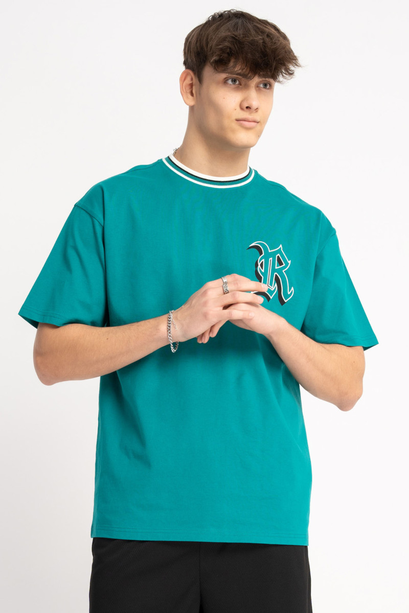 T-shirt w kolorze morskim z grafiką na piersi T-shirt w kolorze morskim z grafiką na piersi