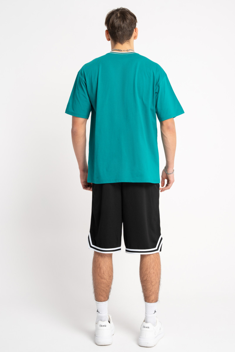 T-shirt w kolorze morskim z grafiką na piersi T-shirt w kolorze morskim z grafiką na piersi