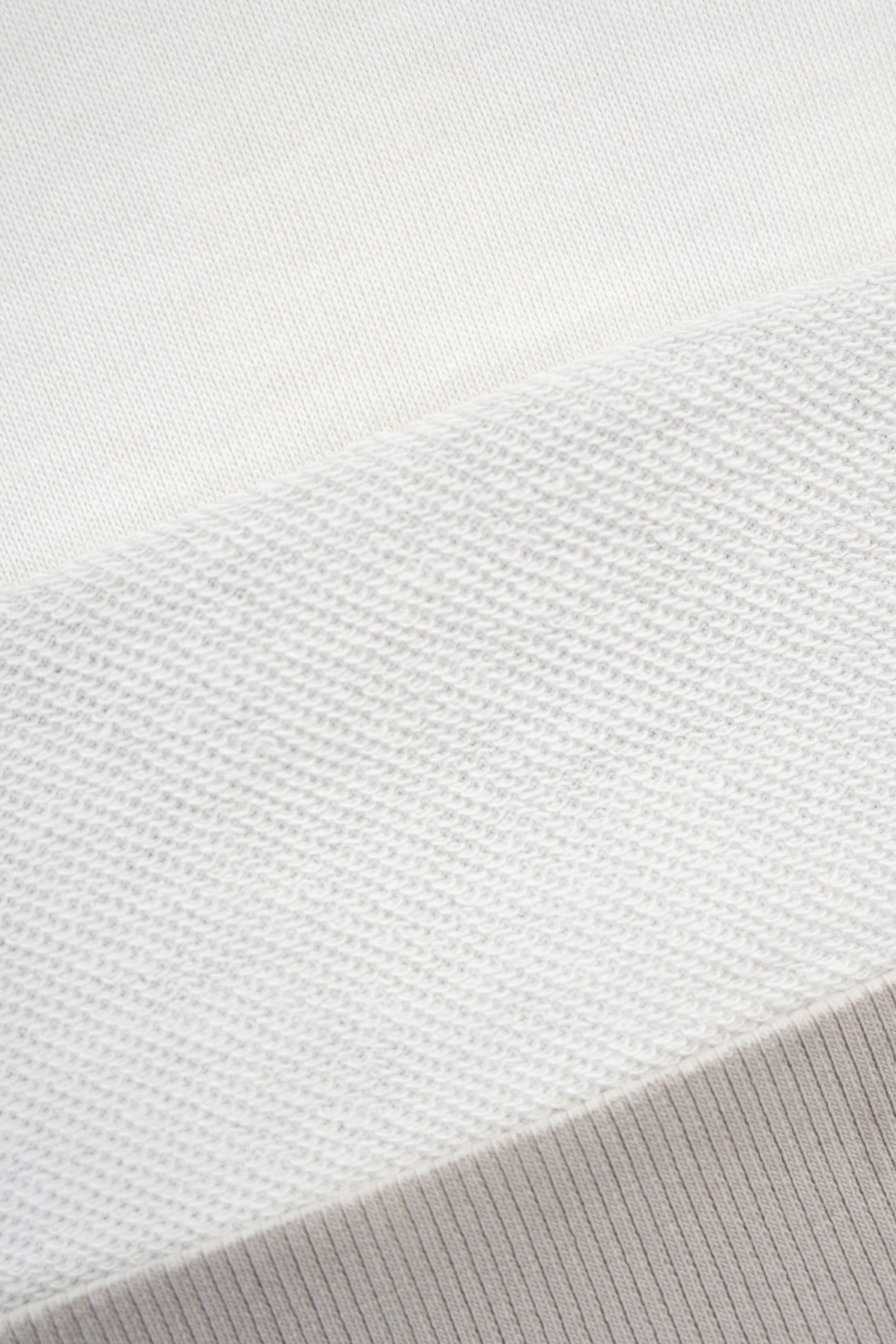 Kremowa bluza z kapturem z autorską grafiką z przodu Kremowa bluza z kapturem z autorską grafiką z przodu