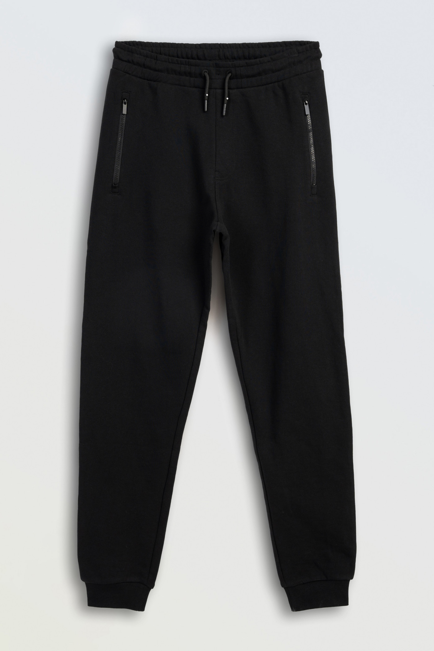 Czarne spodnie dresowe REGULAR z autorską grafiką na nogawce