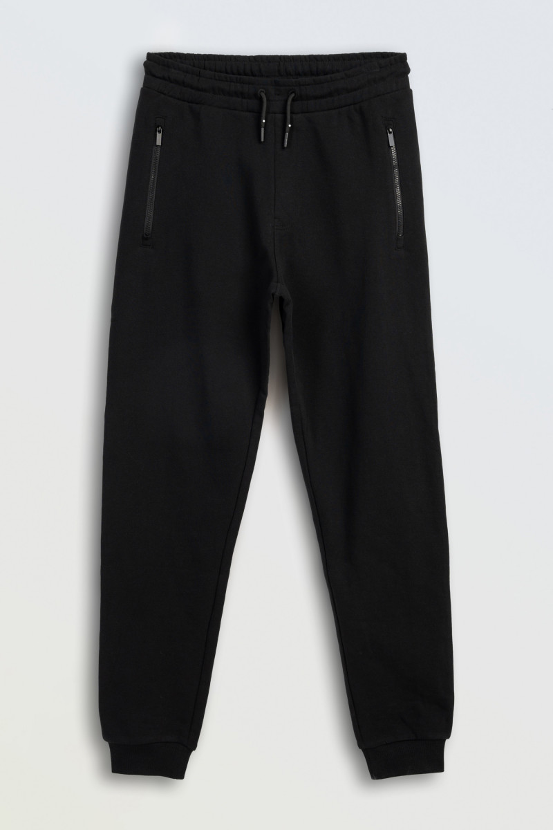 Czarne spodnie dresowe REGULAR z autorską grafiką na nogawce