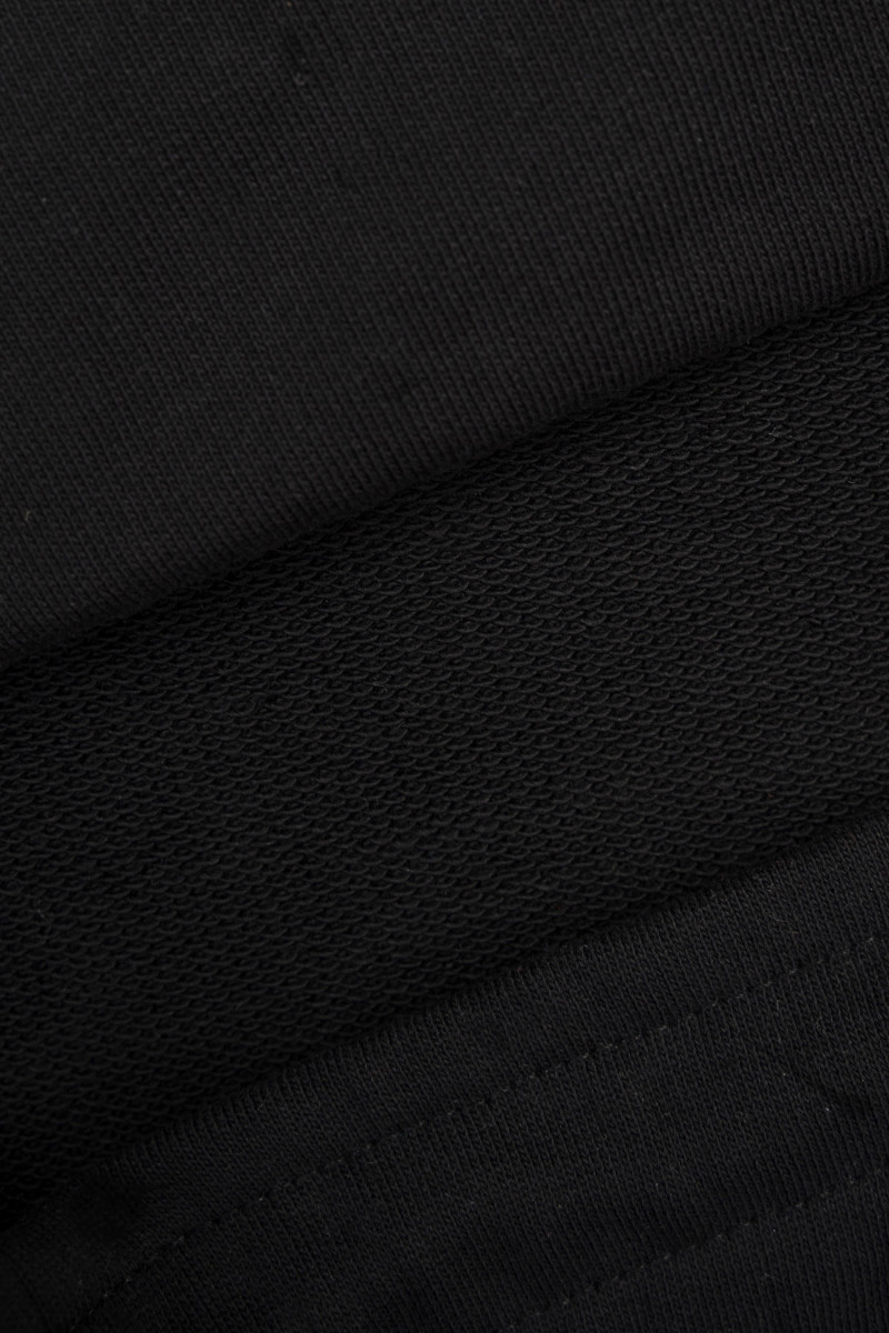 Czarne spodnie dresowe REGULAR z autorską grafiką na nogawce