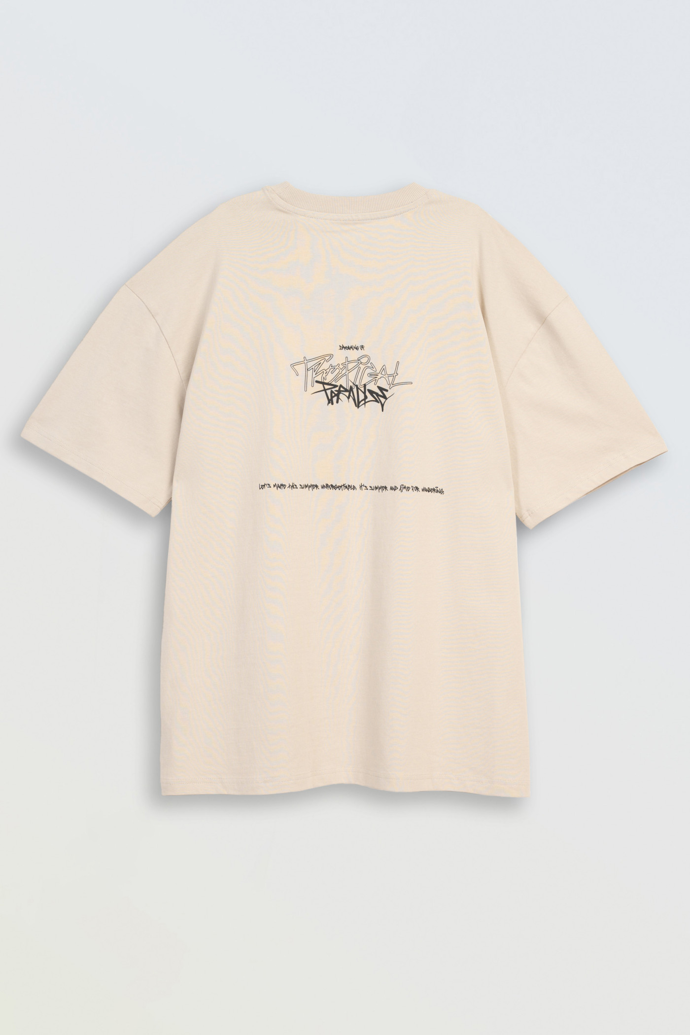 Kremowy t-shirt z autorską grafiką z tyłu Kremowy t-shirt z autorską grafiką z tyłu