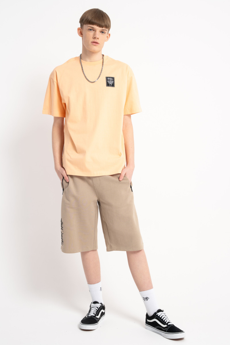 Pomarańczowy t-shirt z autorską grafiką z tyłu