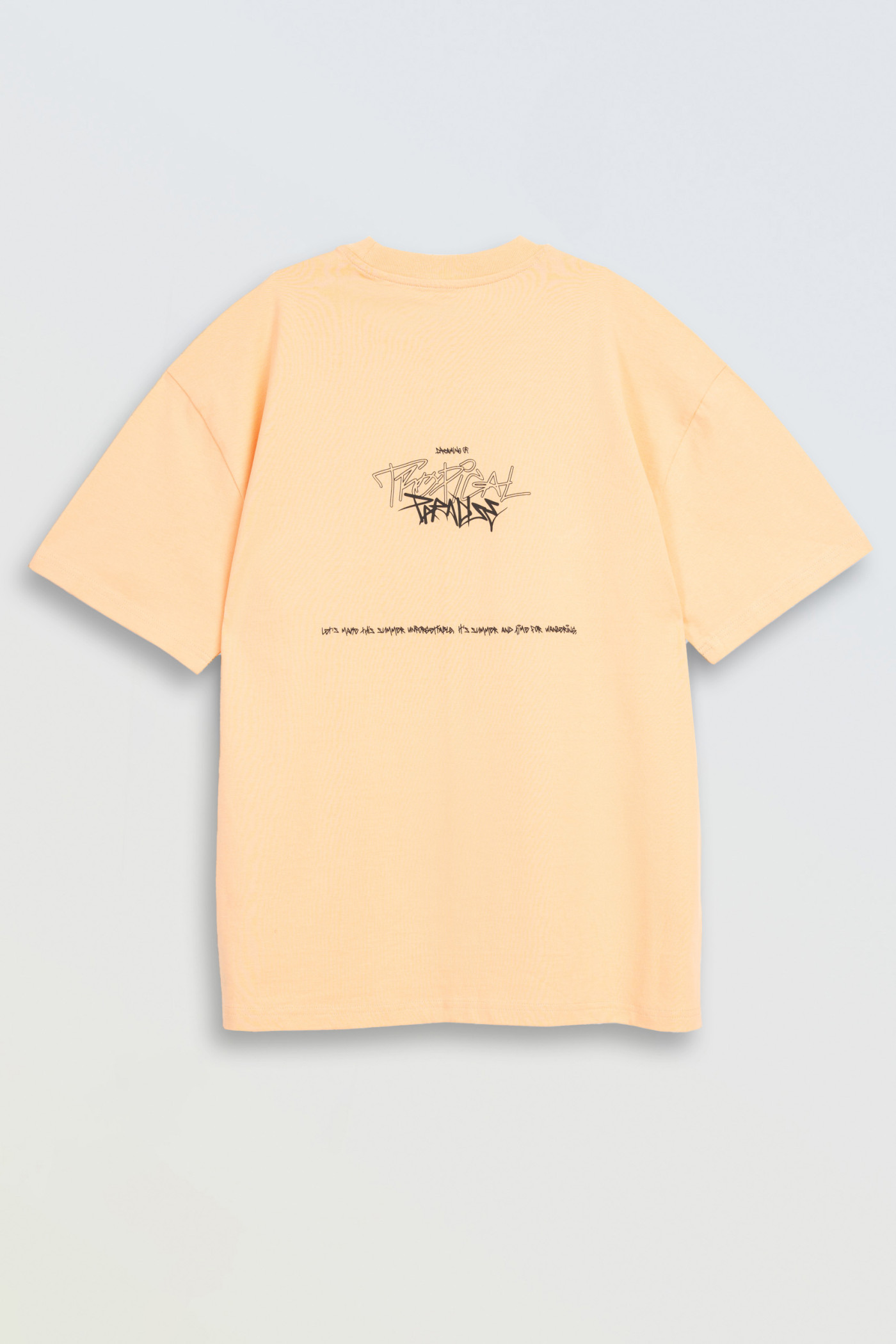 Pomarańczowy t-shirt z autorską grafiką z tyłu