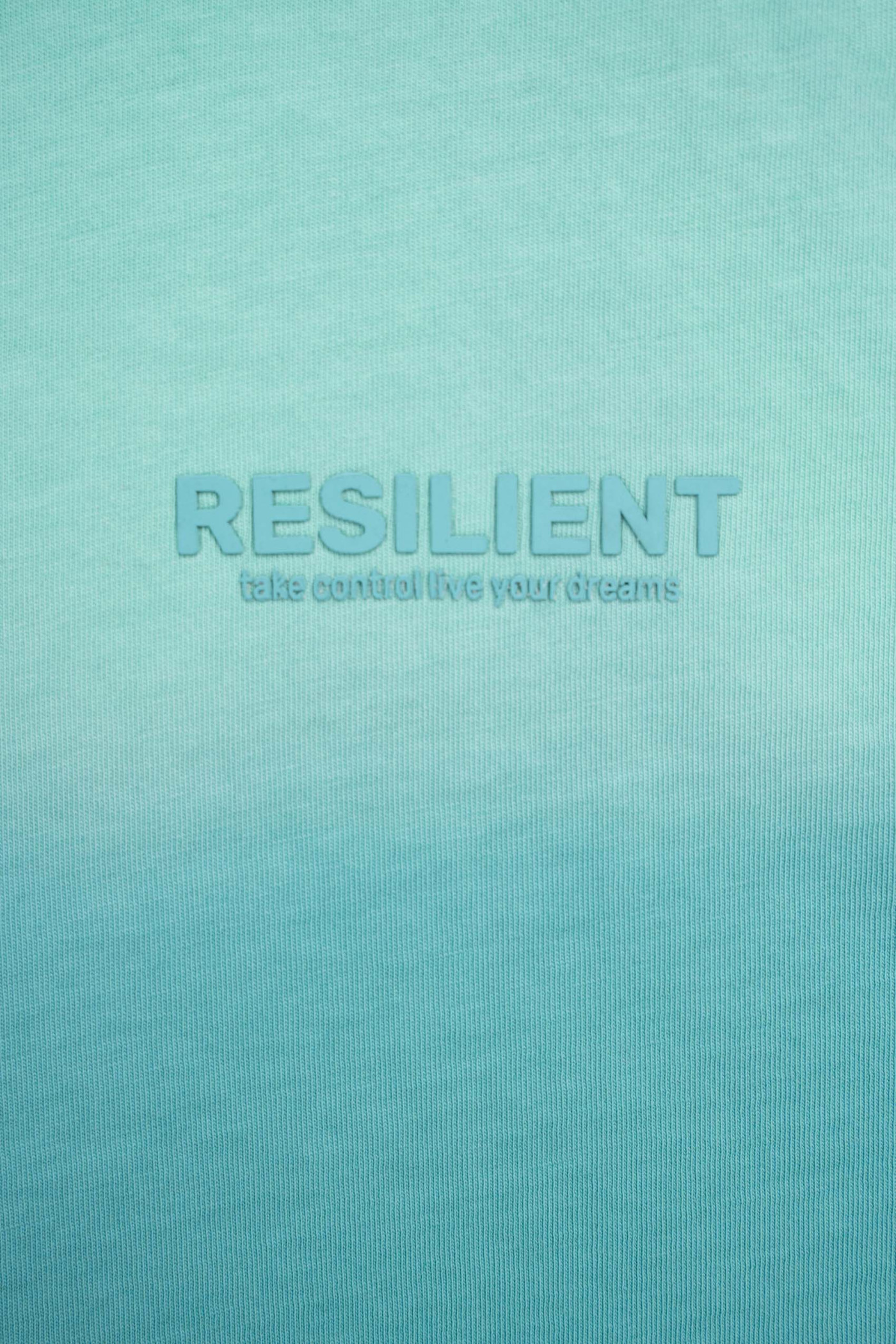 Turkusowy t-shirt z efektem sprayowania