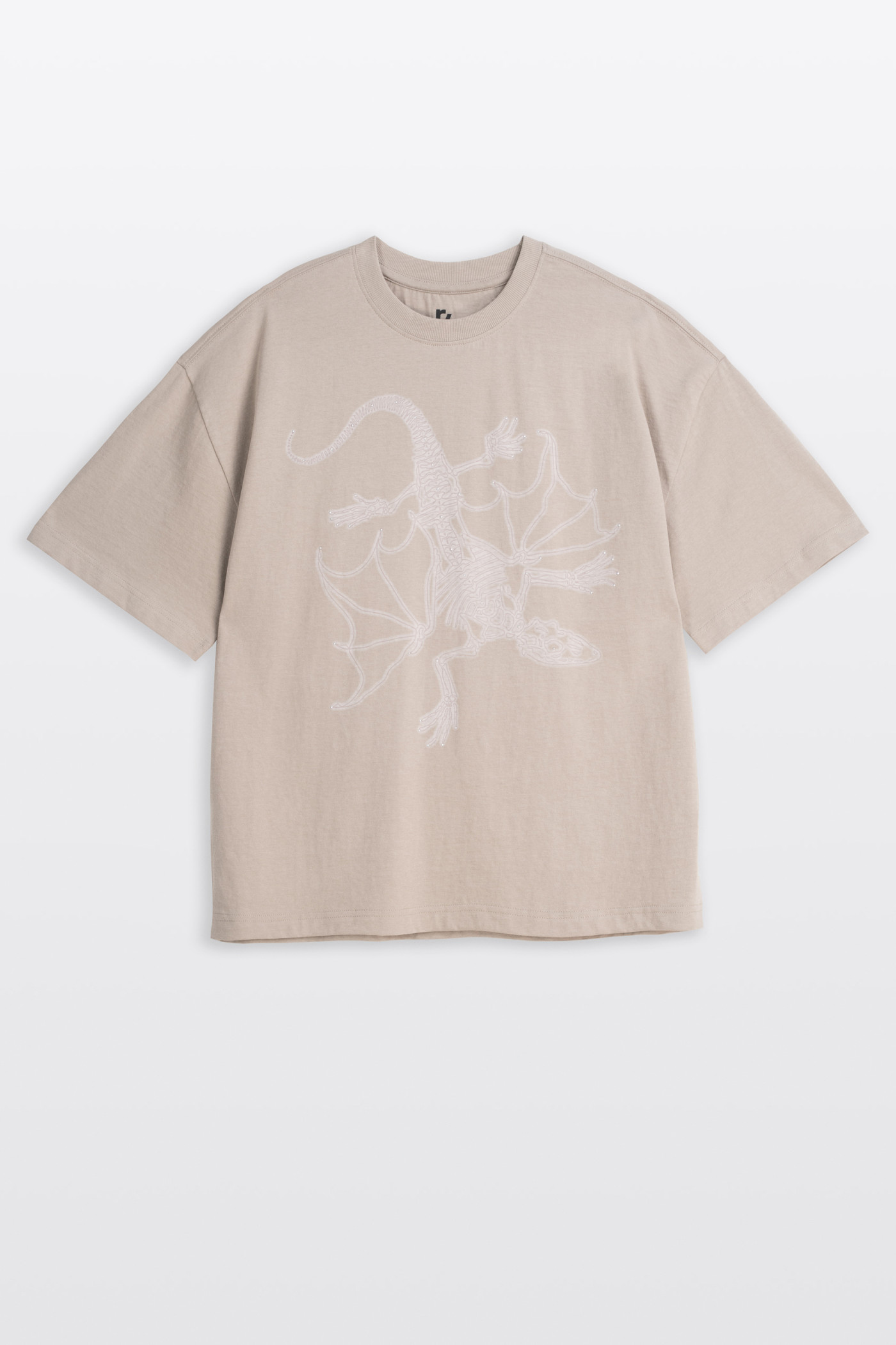 Beżowy t-shirt z autorską grafiką z przodu z kryształkami