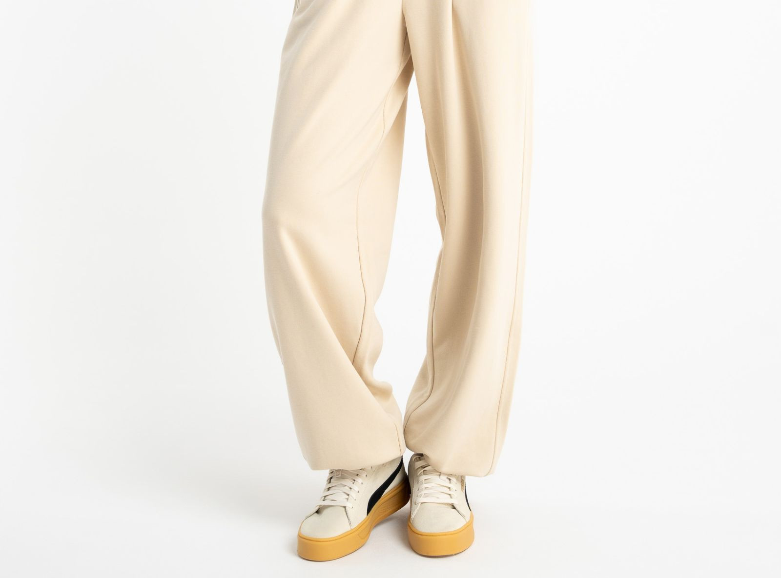 Kremowe spodnie dresowe OVERSIZE bez nadruków