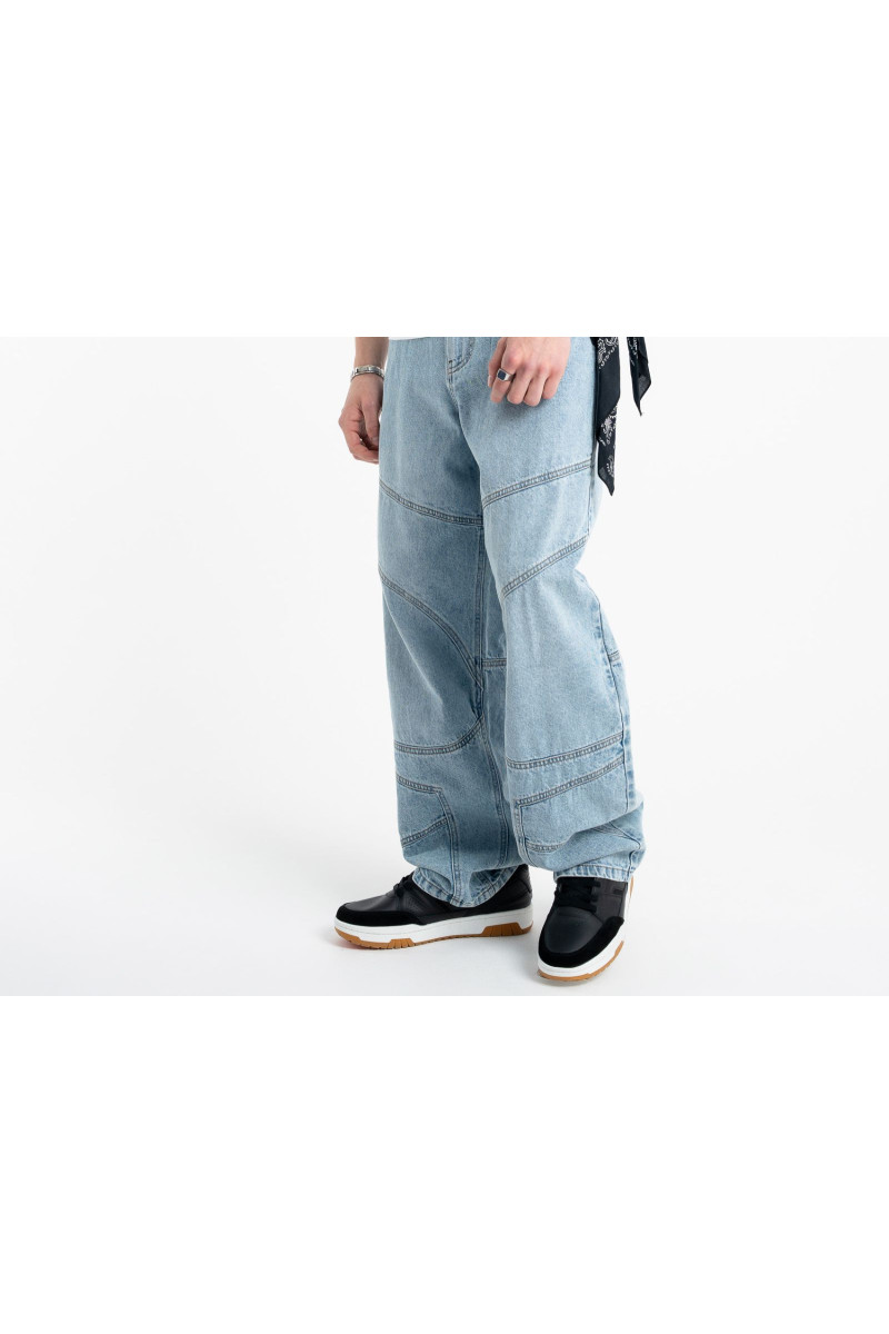Niebieskie spodnie jensowe o kroju BAGGY z modnymi cięciami, niebieski