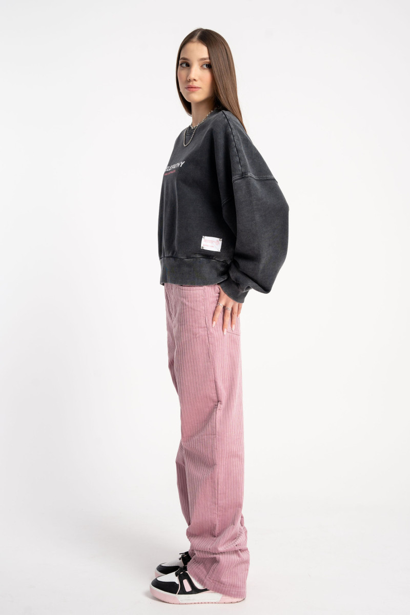 Różowe sztruksowe spodnie z szerokimi nogawkami