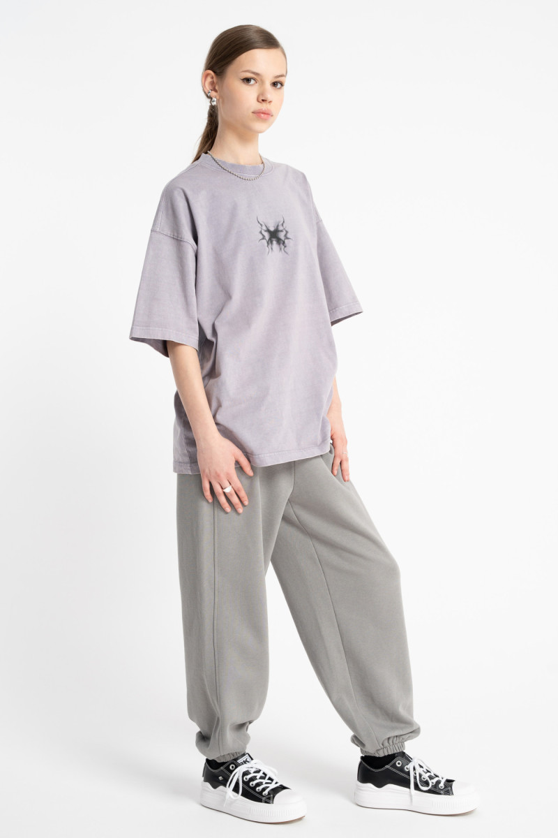 Szare spodnie dresowe OVERSIZE z modnymi cięciami, szary