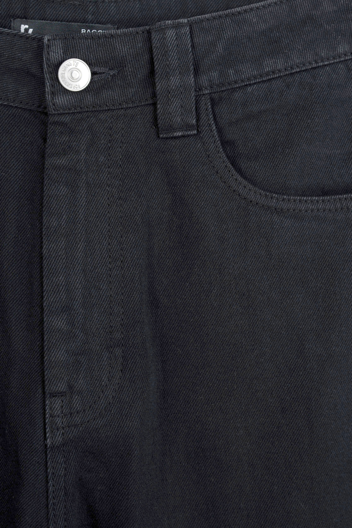 Czarne spodnie jeansowe o kroju BAGGY z naszywanymi gwiazdkami Czarne spodnie jeansowe o kroju BAGGY z naszywanymi gwiazdkami